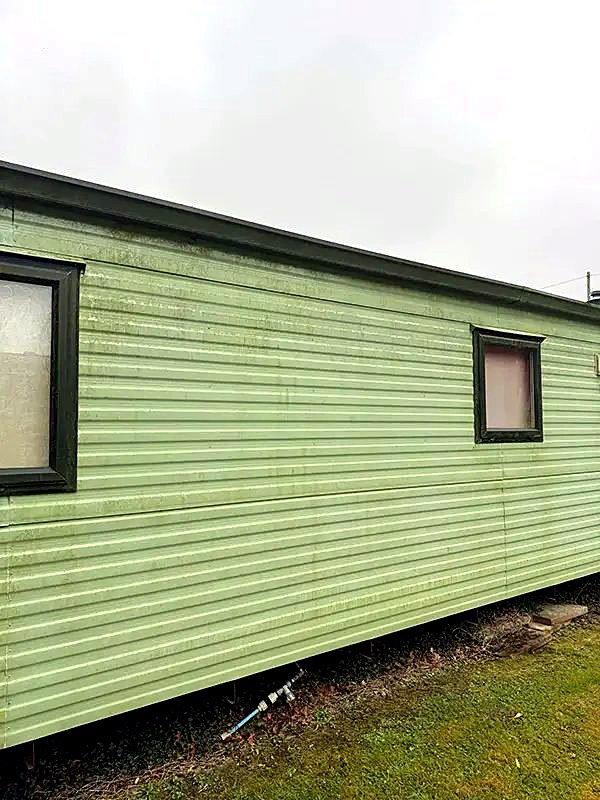 Static caravan exterior after soft wash