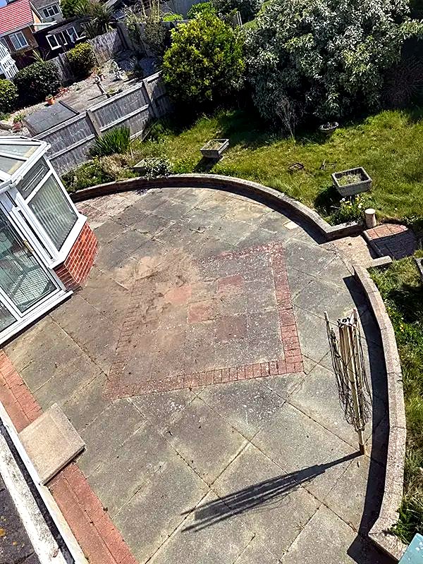 Circular patio after pressure washing