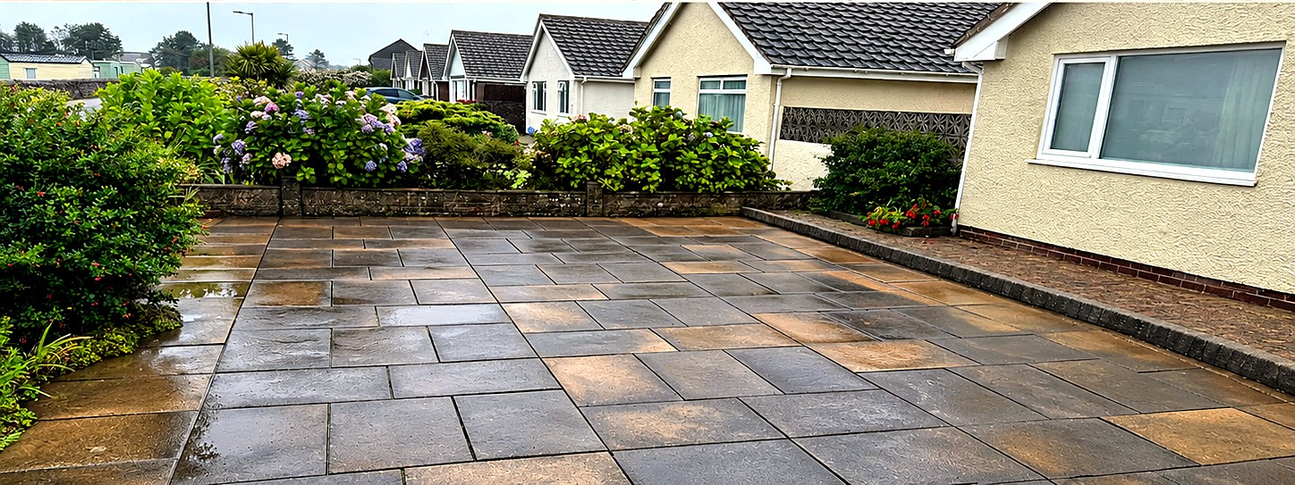 Patio before cleaning, dull with algae staining