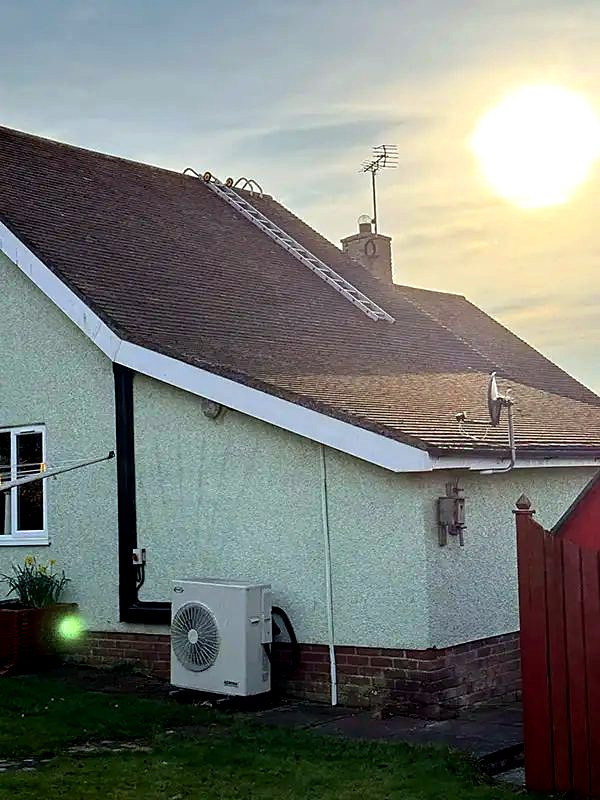 Roof after moss removal and bio-cide treatment