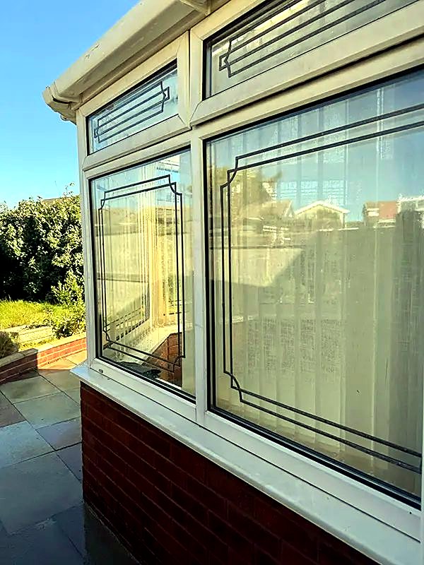 Conservatory windows being cleaned